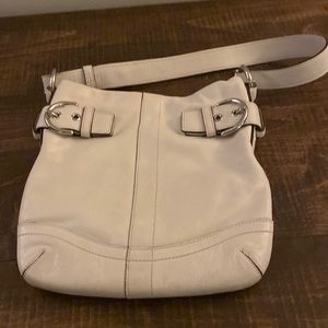 Small beige coach crossbody. Used.